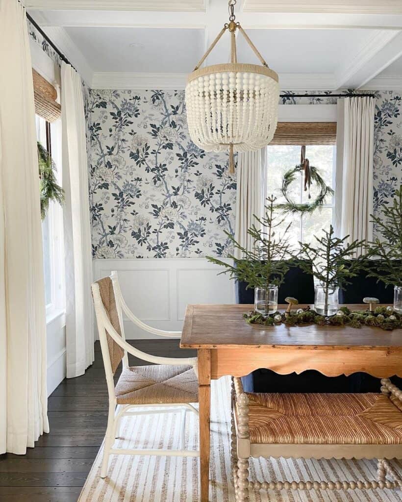 Whimsical Wallpapers and Pine Branches in a Dining Room