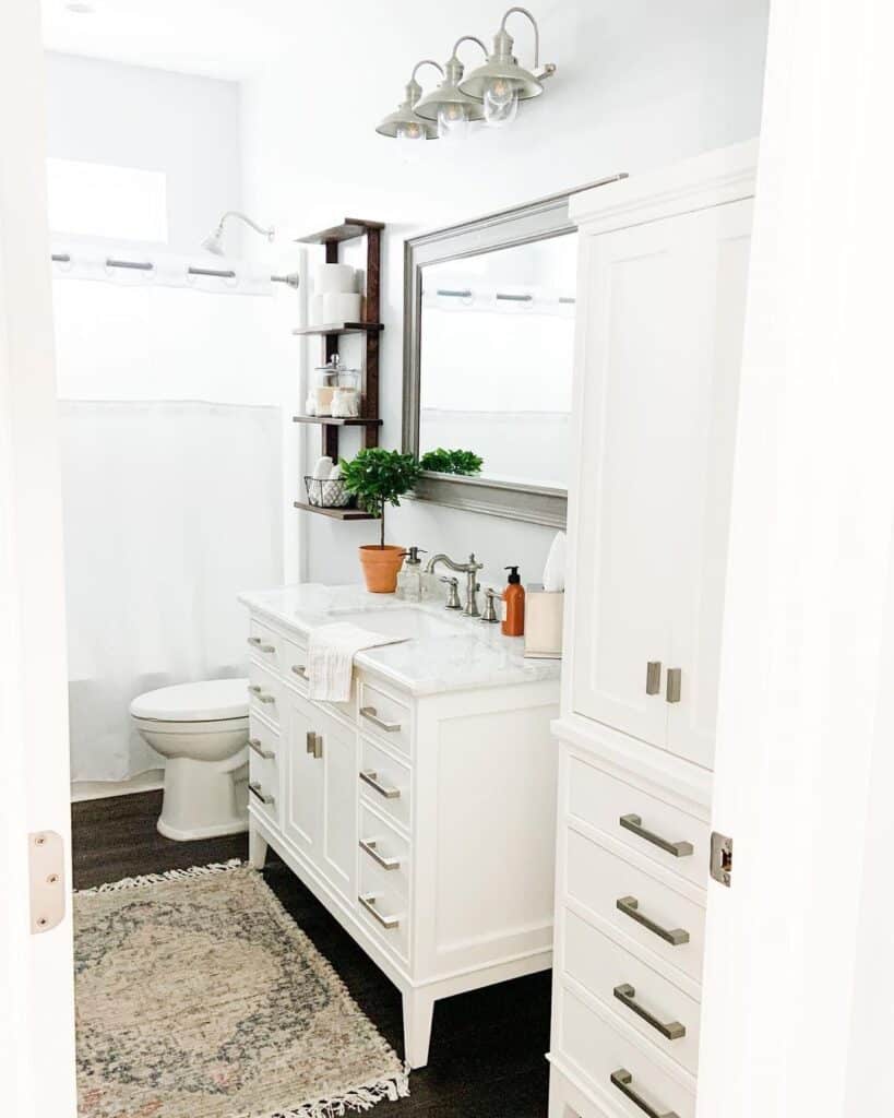 White Bathroom with Gray Mirror