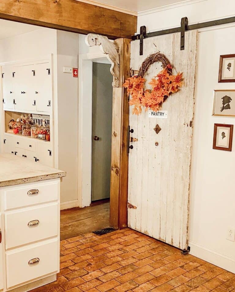 White Farmhouse Door With Orange Wreath