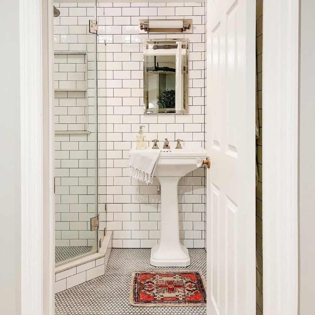 White Penny Tile Bathroom with Pedestal Sink