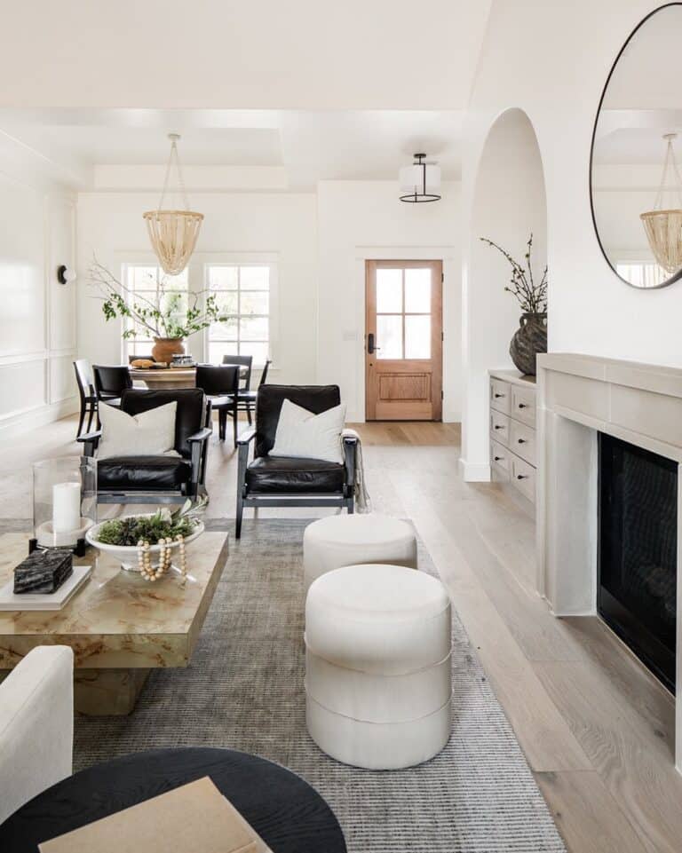 White Pillows and White Poufs in a White Living Room