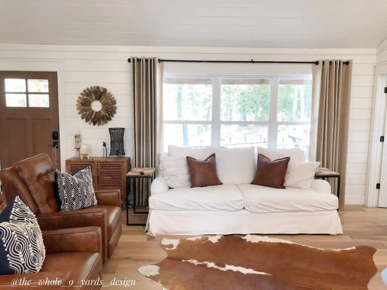 White Shiplap and Brown Leather Accented Living Room