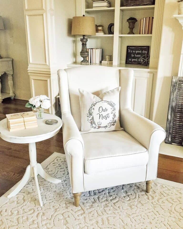 White Upholstered Chair with a Side Table