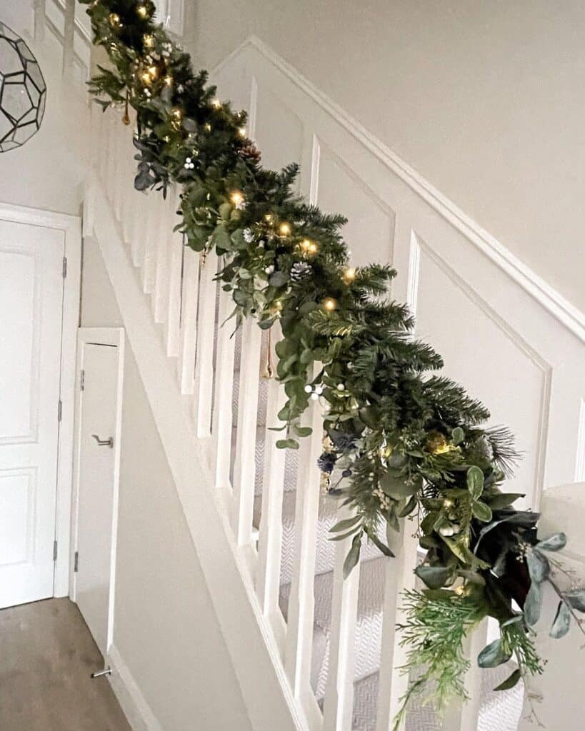 White Wainscoting Stairs with Garland