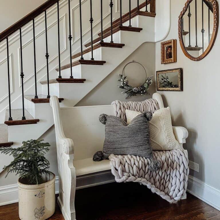 White Wainscoting Stairs with Wrought Iron Spindles