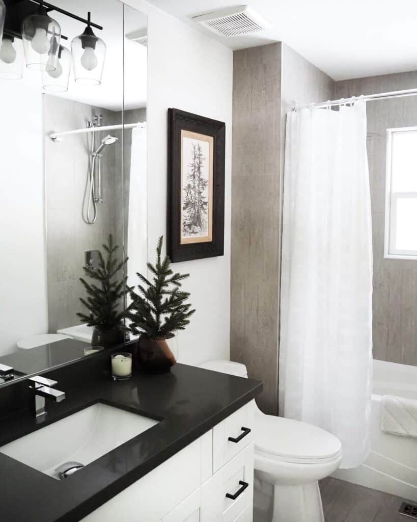 White Washstand with Black Bathroom Countertops