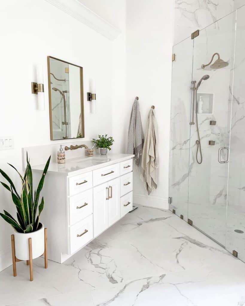 White and Gray Marble Bathroom with Tall White Baseboards