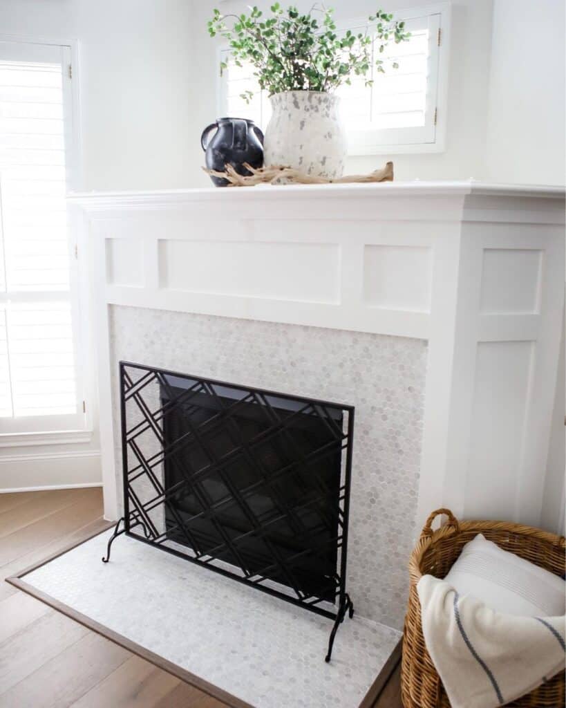 White and Light Gray Penny Tile Corner Fireplace