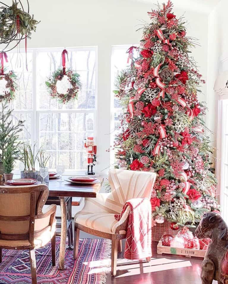 Window Wreaths Displayed Behind Christmas Tree