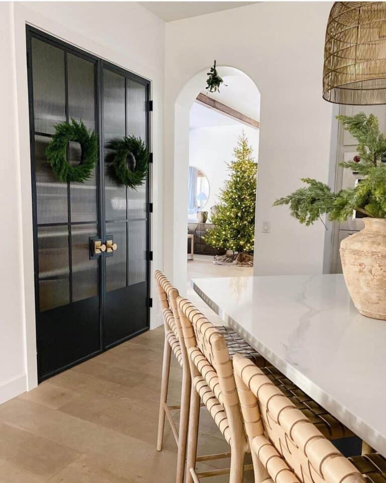 Wreaths on Black Double Pantry Doors With Glass