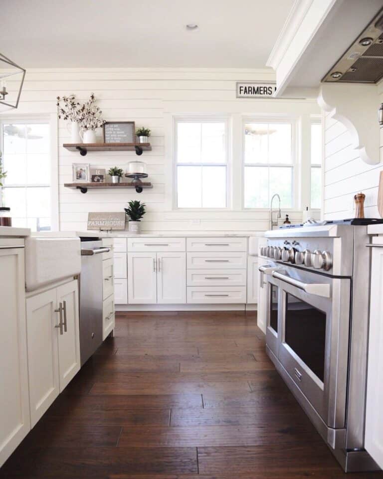 A Bright Kitchen With a Dark Hardwood Floor