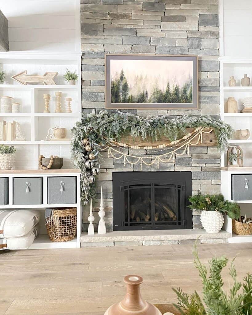A Garland Over the Mantel on a Stone Fireplace
