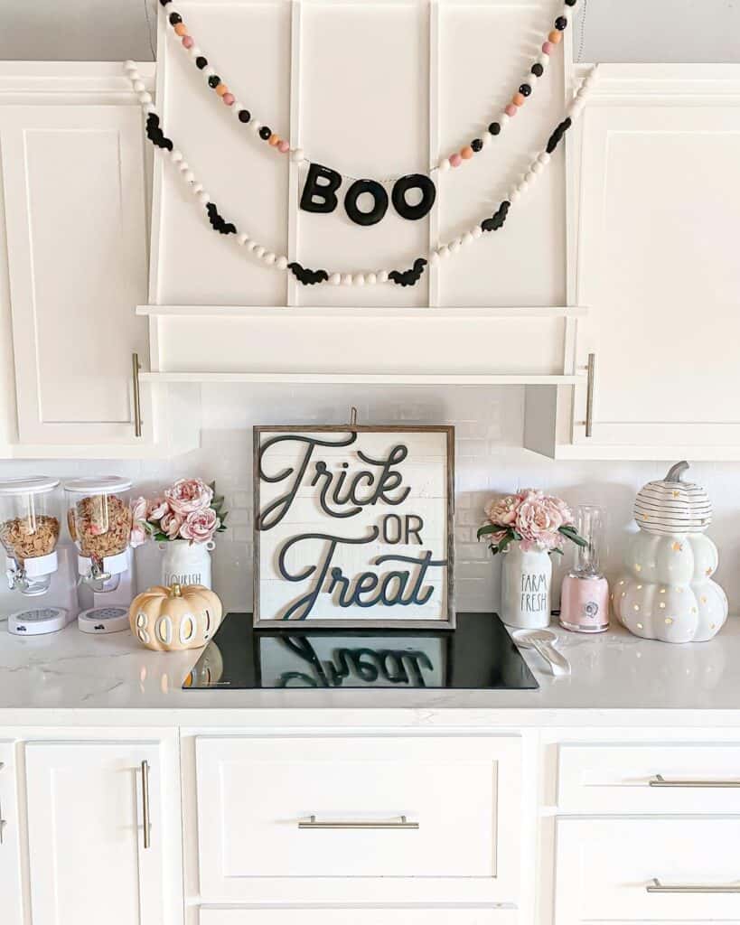 A Halloween Kitchen Sign and Pink Flowers