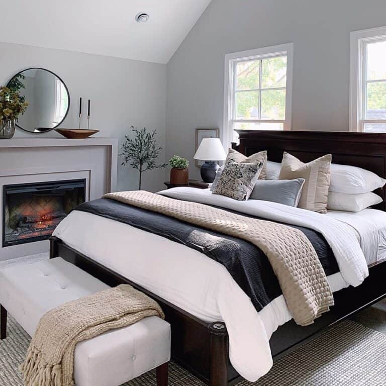 A Light Gray Fireplace in a Bedroom