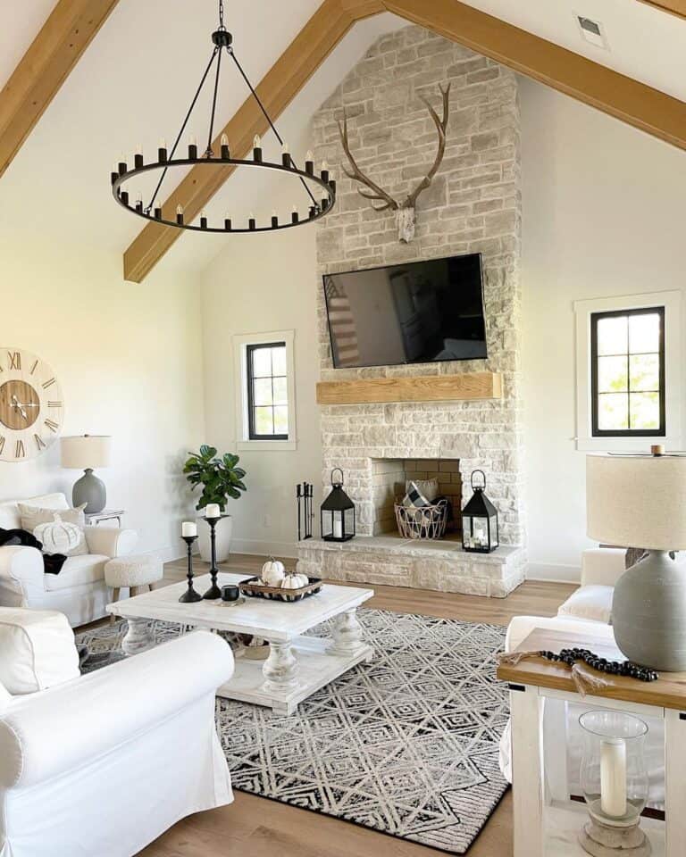A Stag Head on a Beige Stone Fireplace