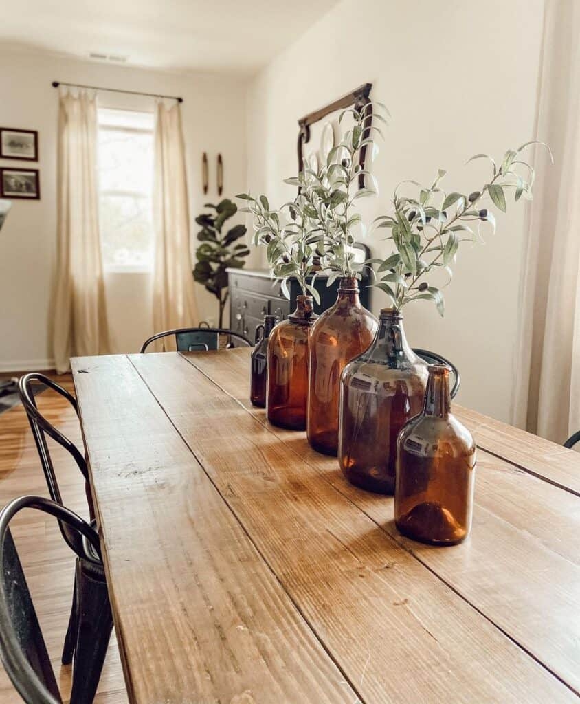 Amber Jugs Filled with Plant Centerpieces