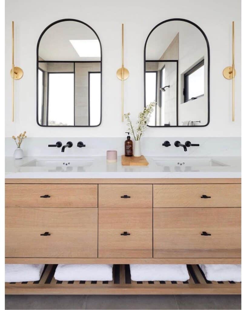 Arched Mirrors Over Light Wood Vanity