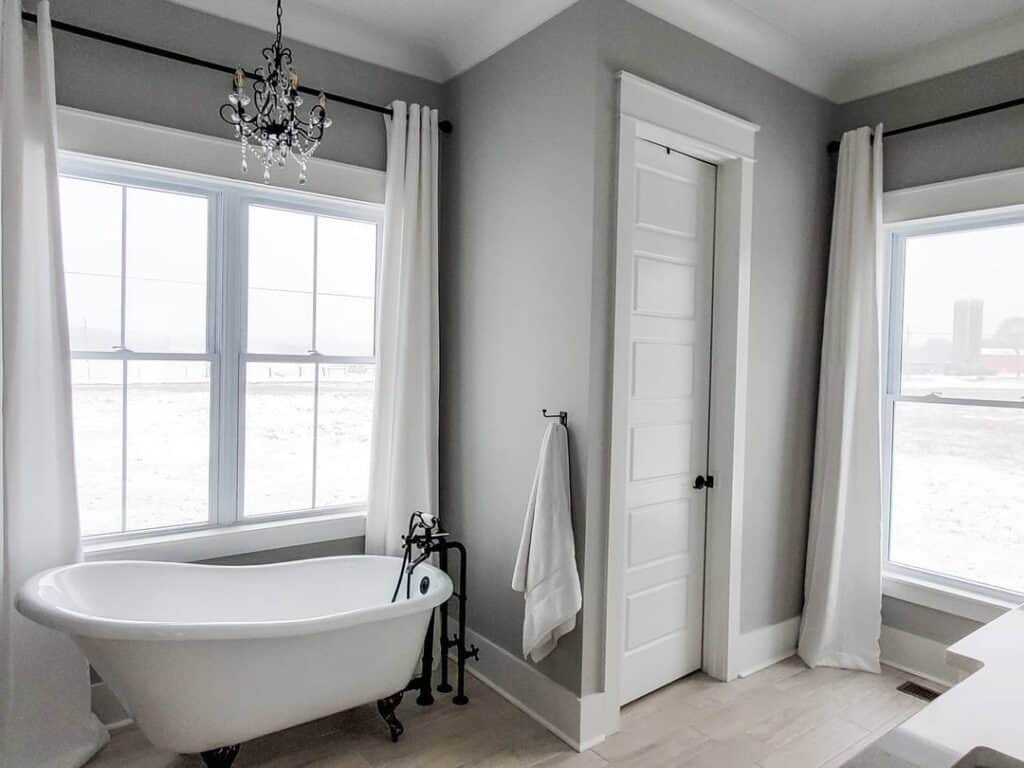Bathroom Window Curtains Against Gray Walls