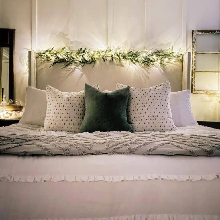Bed with White and Green Throw Pillows