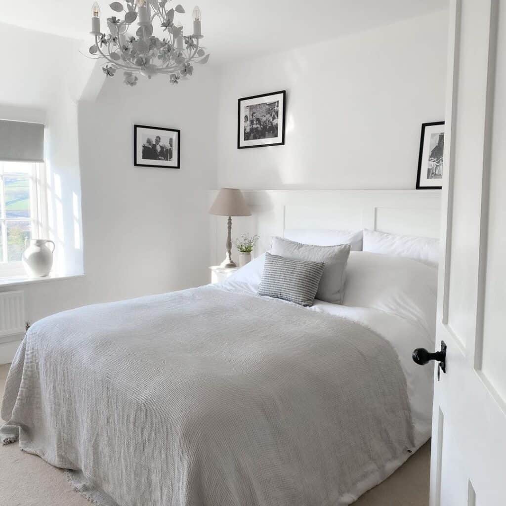 Bedroom with White Wooden Headboard