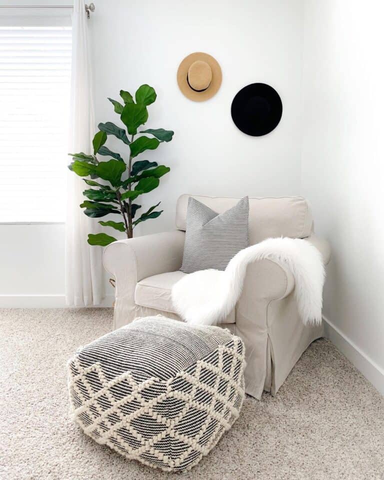 Beige Armchair with Black and White Pouf