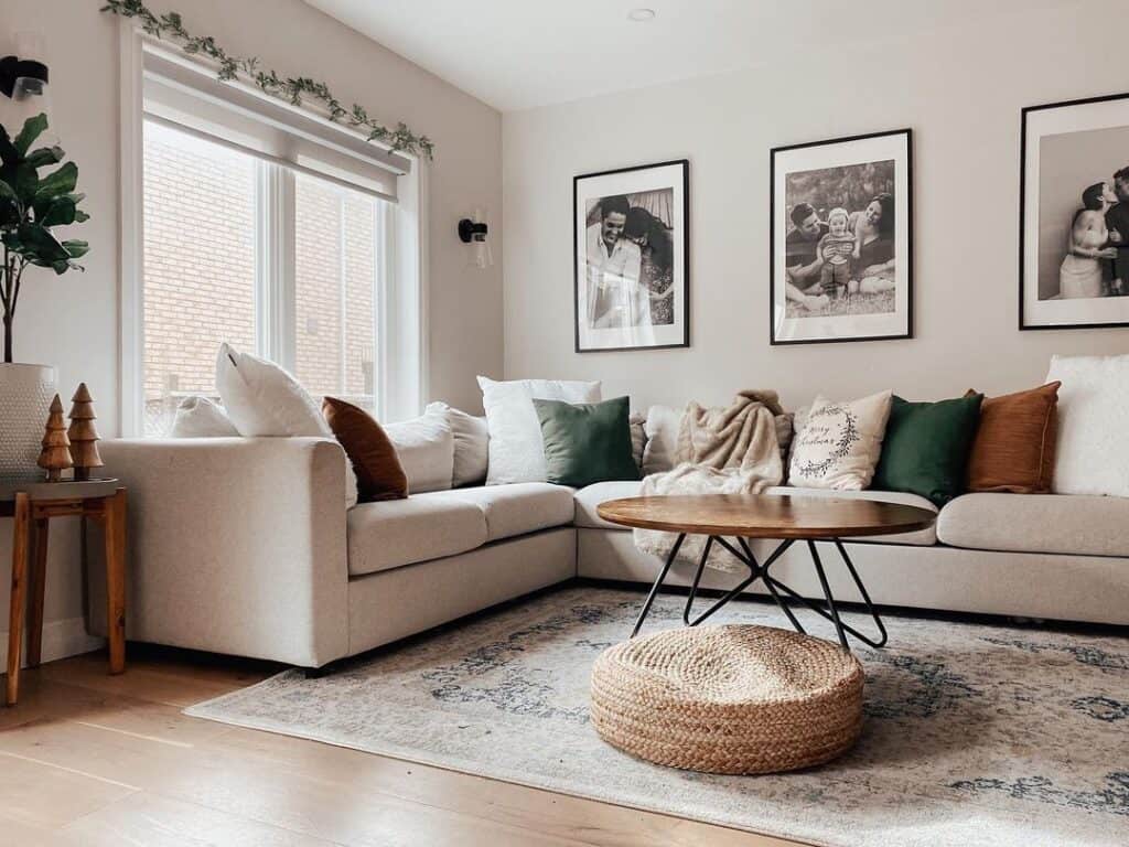 Beige Sectional with Green Accent Pillows