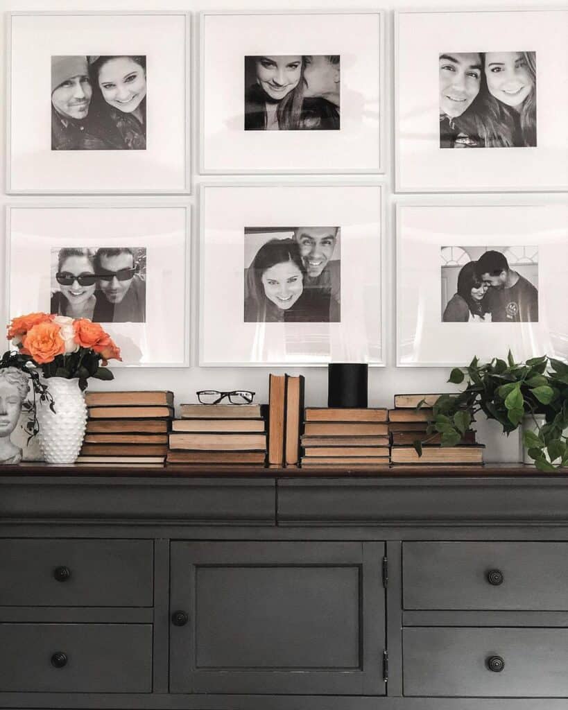 Black Dresser with Picture Wall Background