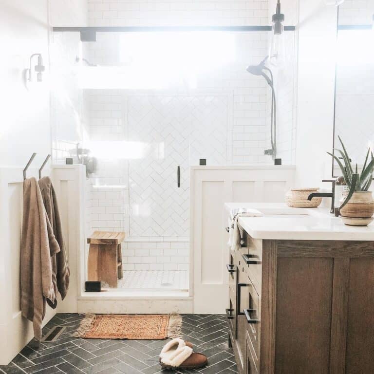 Black Herringbone Tile Flooring in Bathroom