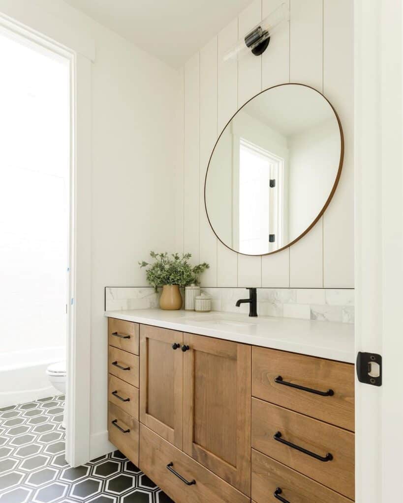 Black and White Hexagon Bathroom Floor with Wood Vanity
