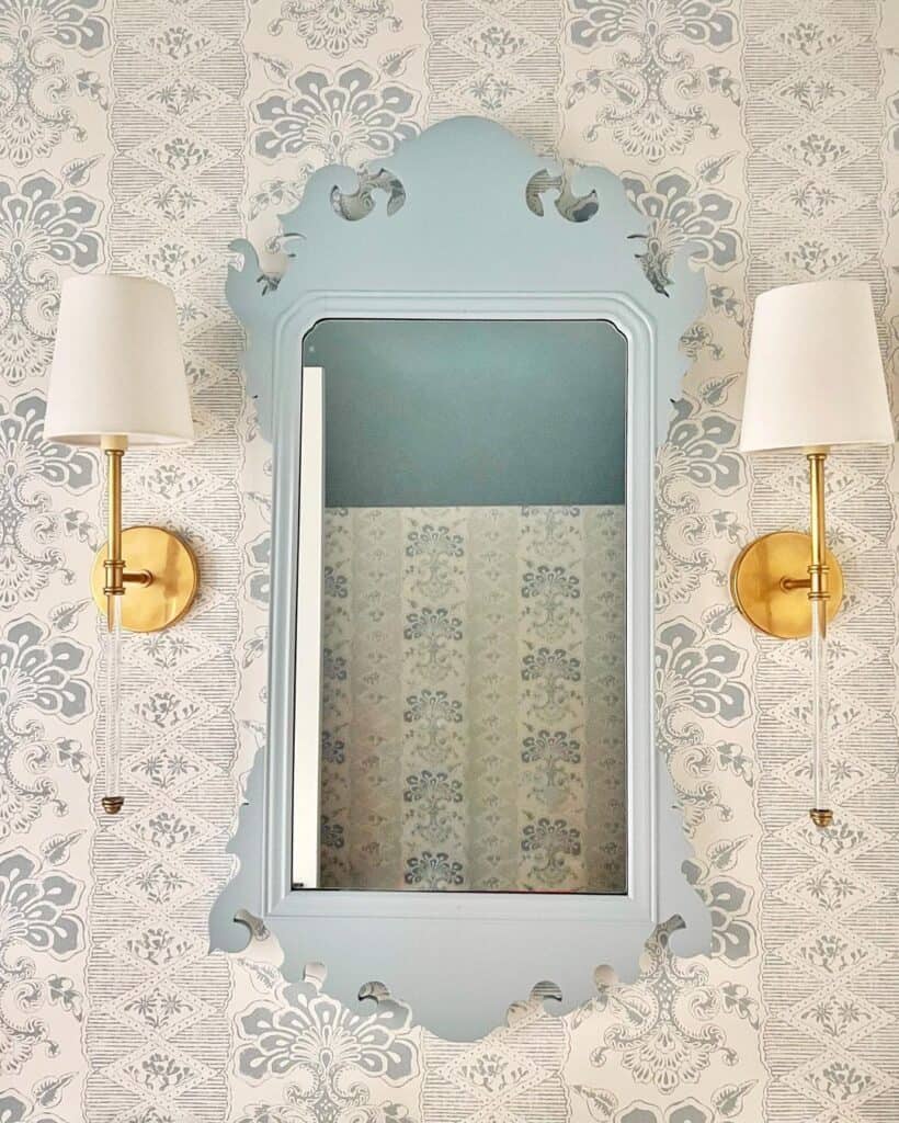 Blue and Gray Wallpaper and Brass Sconces