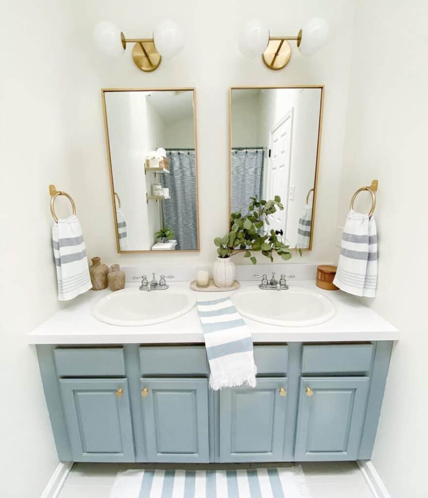 Brass Accessories Around Blue Double Vanity - Soul & Lane