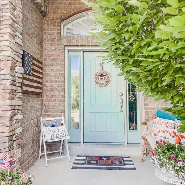 Brick Home with Light Blue Farmhouse Front Door
