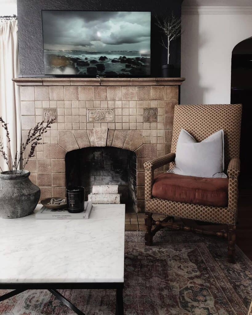 Brown Tile Fireplace and a Cozy Armchair