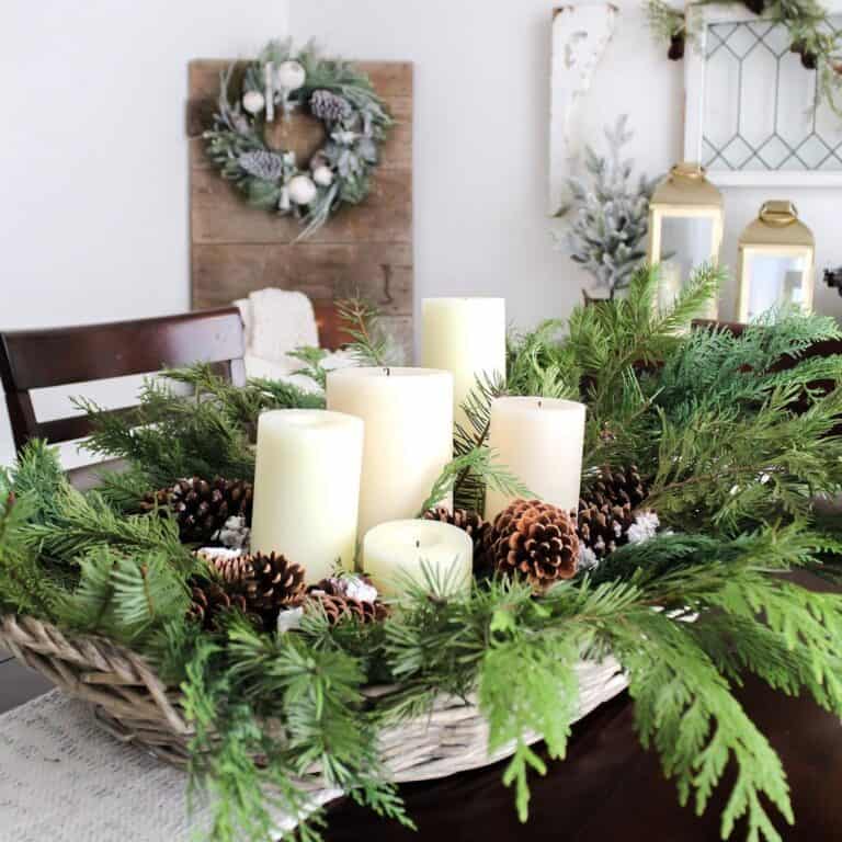 Candle and Pine Branch Centerpiece