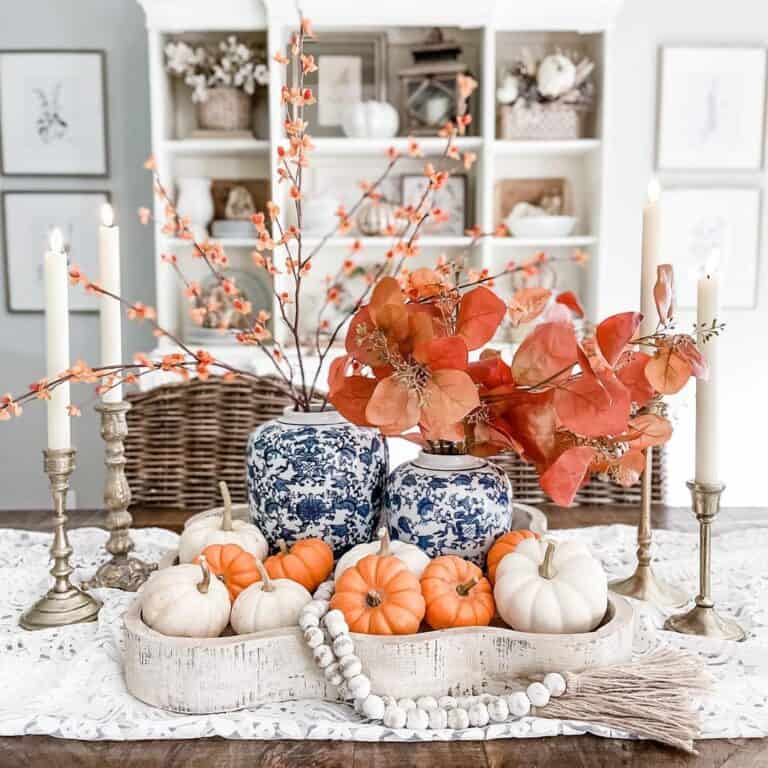 Centerpiece with Miniature Pumpkins and Autumn Leaves