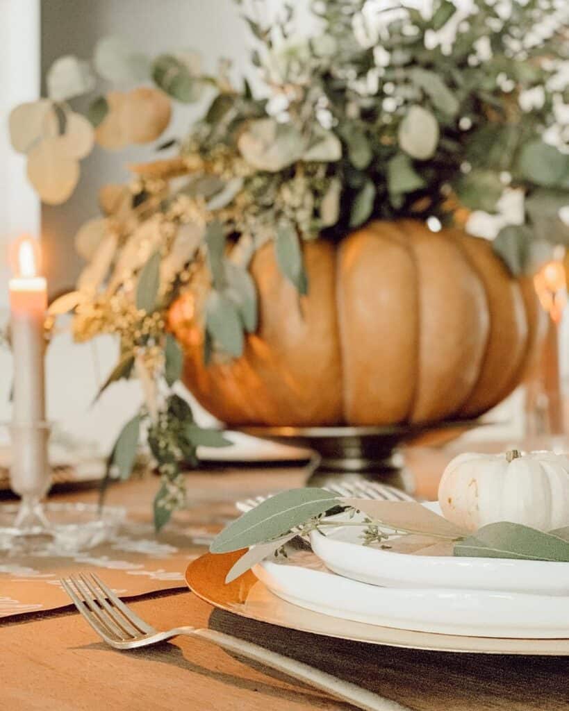 Close-Up Table Setting with Pumpkin Centerpiece