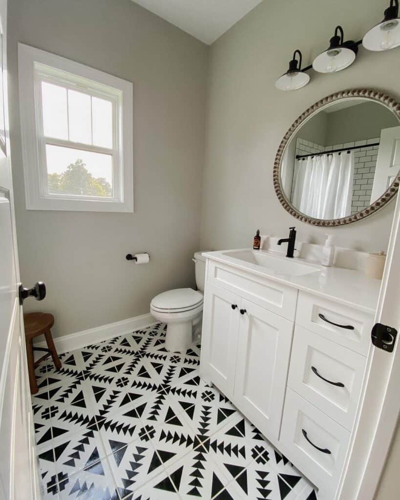Contrasting Floor Tile and White Shaker Cabinets