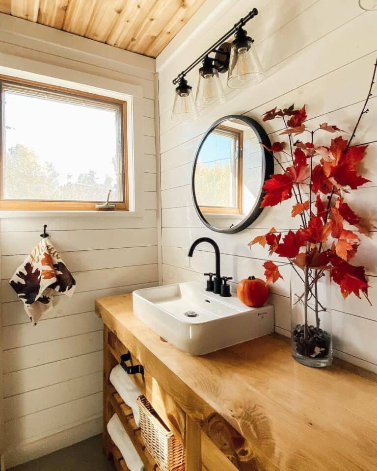 Cream Shiplap Bathroom with Red Leaves