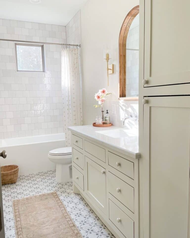 Cream Vanity with Floor to Ceiling Cabinets