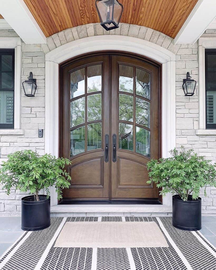 Dark Wood Door and Stacked Stone Porch