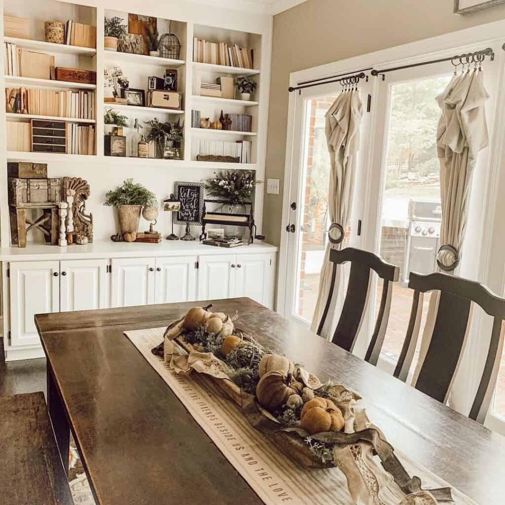 Dining Room with Pumpkin-Filled Centerpiece