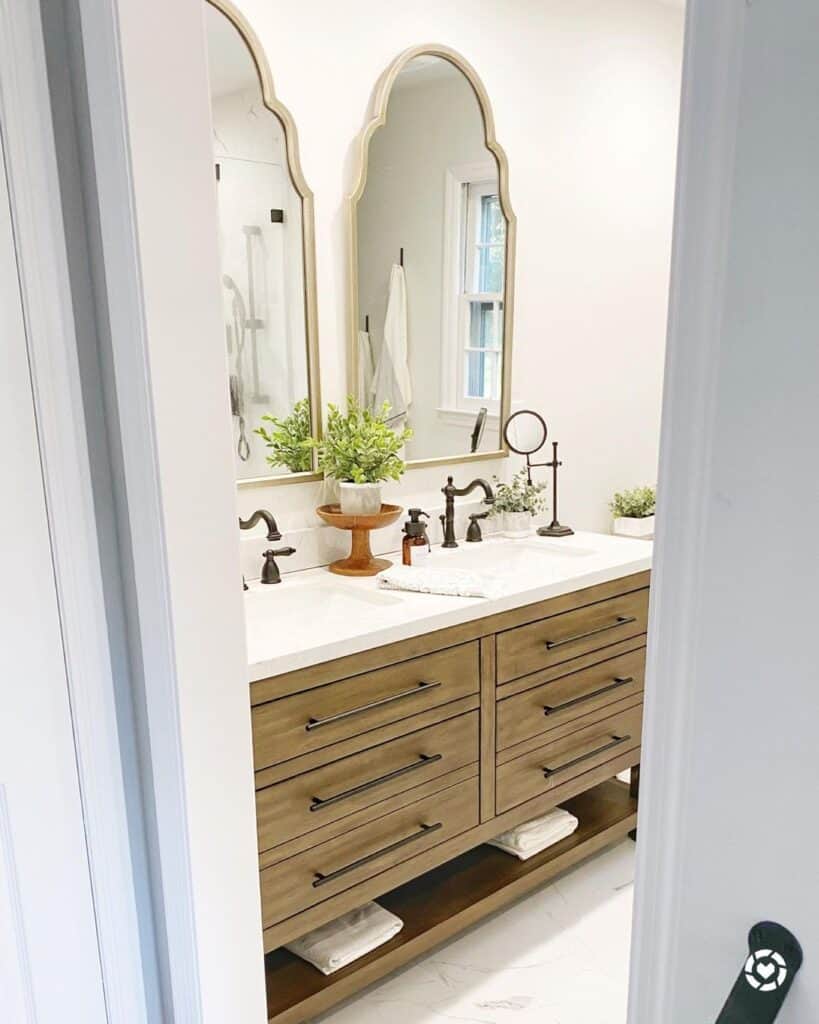 Double Vanity with Gold-Framed Scrolled Mirrors
