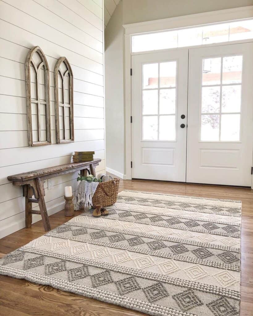 Entryway with Wood Window Frame Decor and Rustic Bench