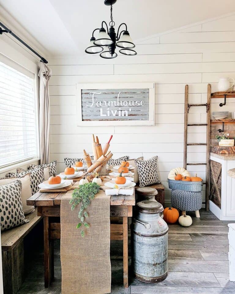 Farmhouse Dining Room with Rolling Pin and Pumpkin Centerpieces