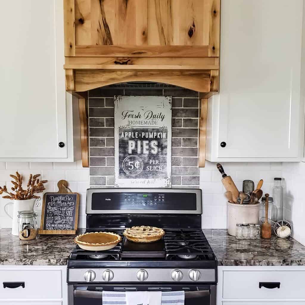 Farmhouse Kitchen Signs with Black Tile Backsplash