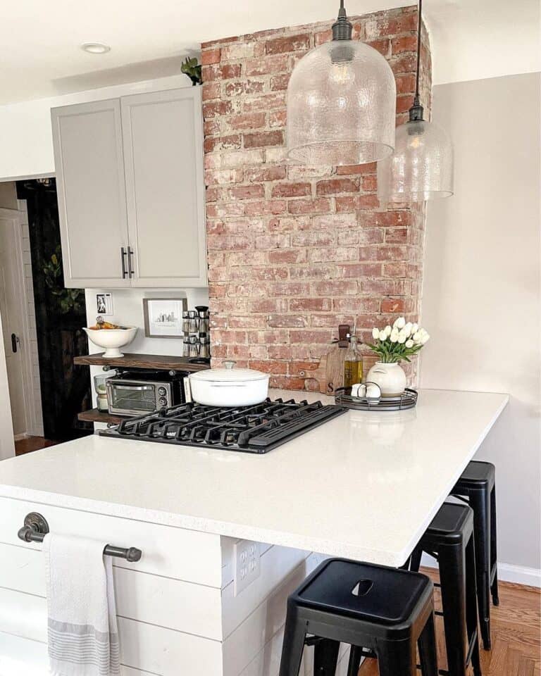Farmhouse Kitchen With Brick Accent Wall
