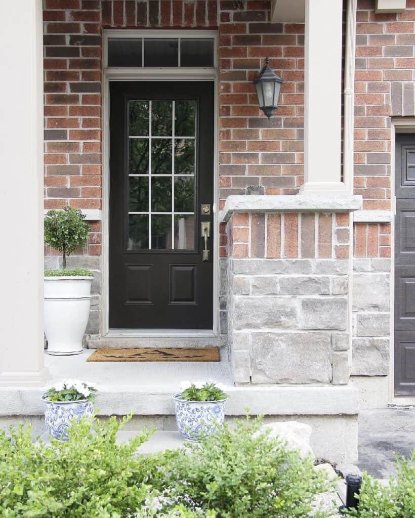 Farmhouse Outdoor Lighting on a Red Brick House