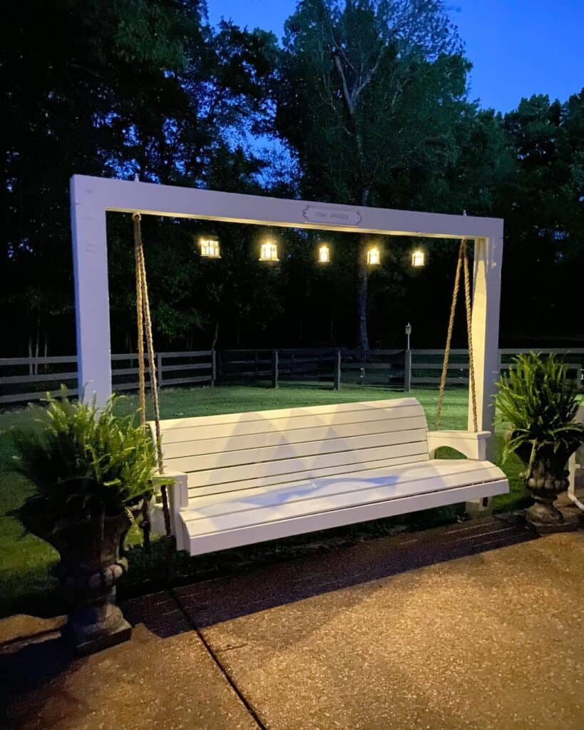 Farmhouse Outdoor Lighting on a White Swing