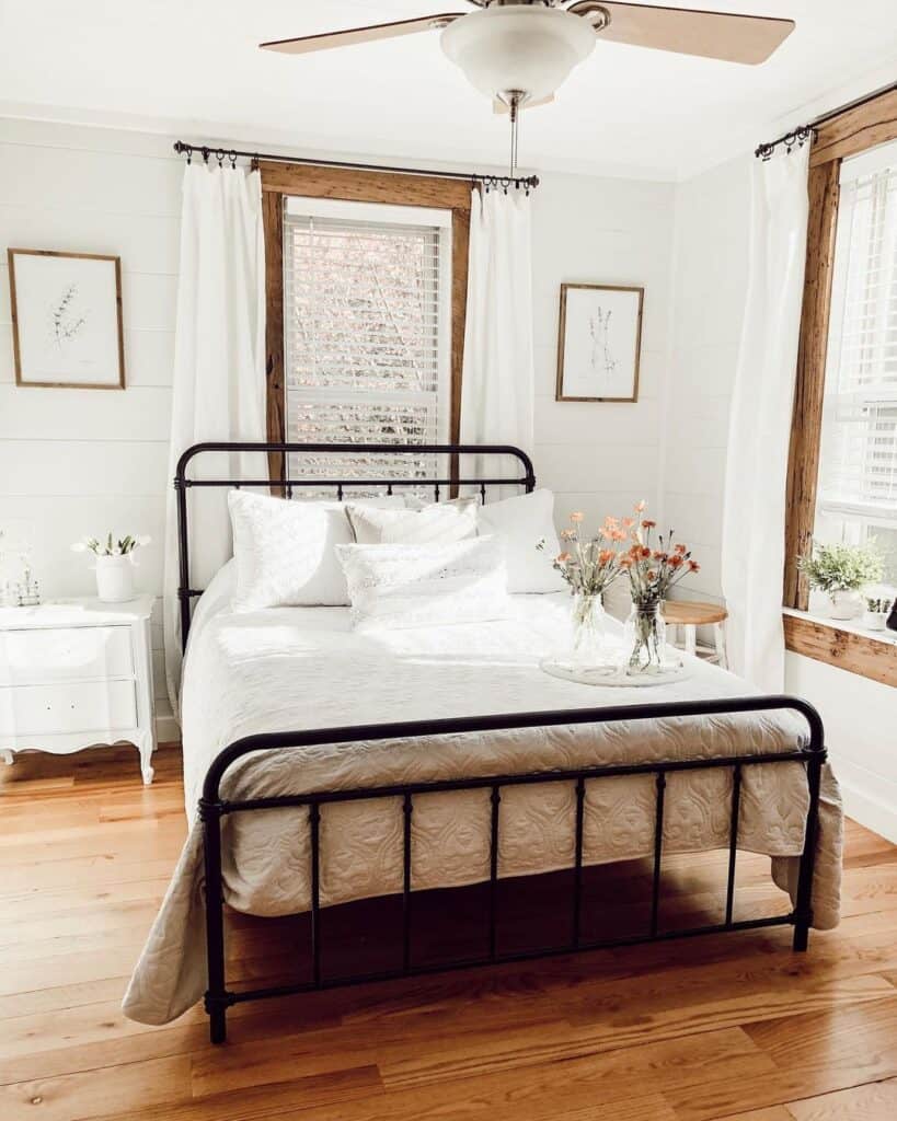 Full Black Bed Frame with White Bedding