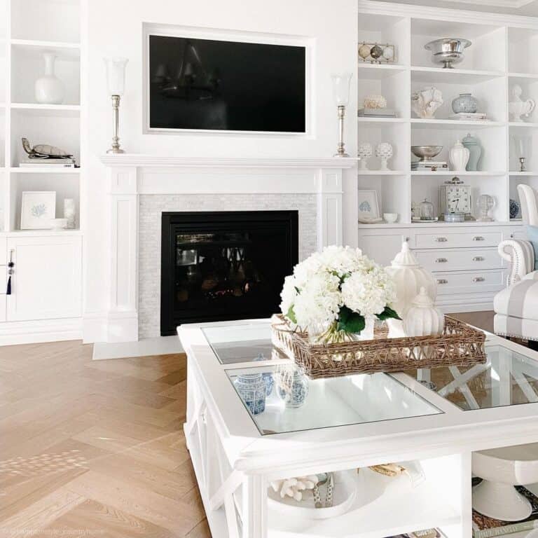 Glass Coffee Table on a Herringbone Wood Floor